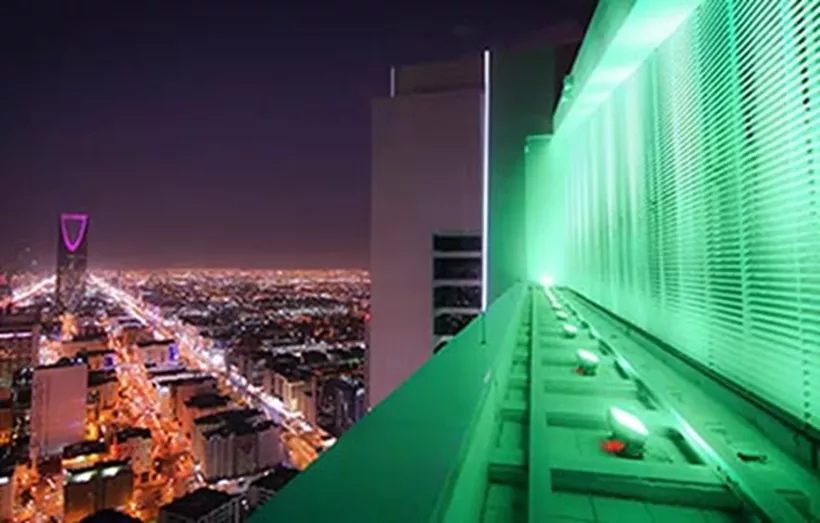 A breathtaking nighttime view over Riyadh’s skyline, with the iconic Kingdom Tower in sight—capturing the pulse of business in Saudi Arabia’s capital.